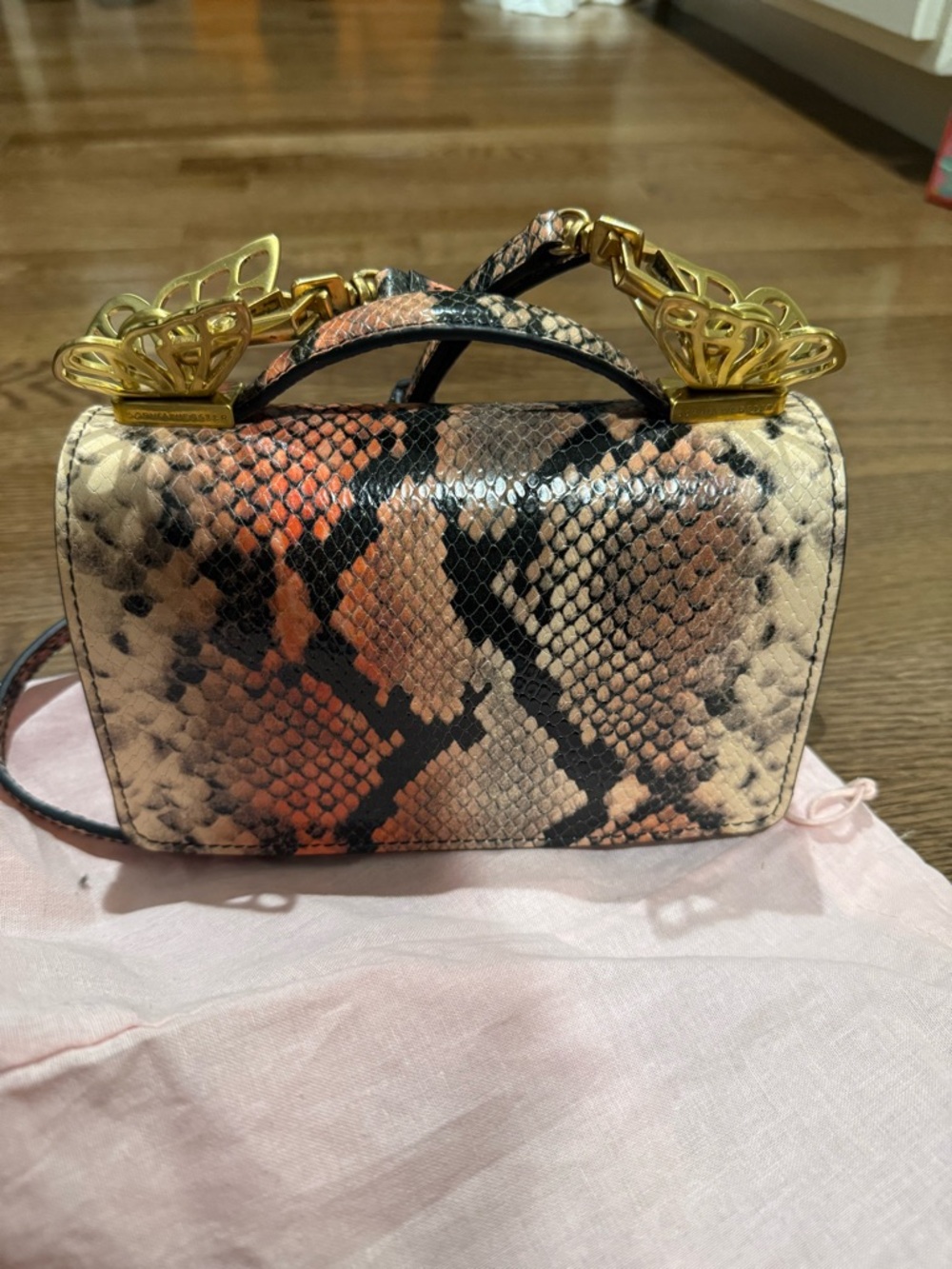 Sophie Webster Snake-Print Top Handle Crossbody Bag in Peach and Black